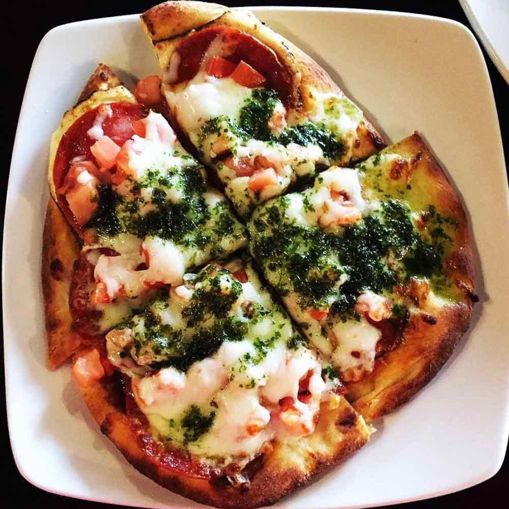 pesto on flatbread suggested by victoria leigh photography