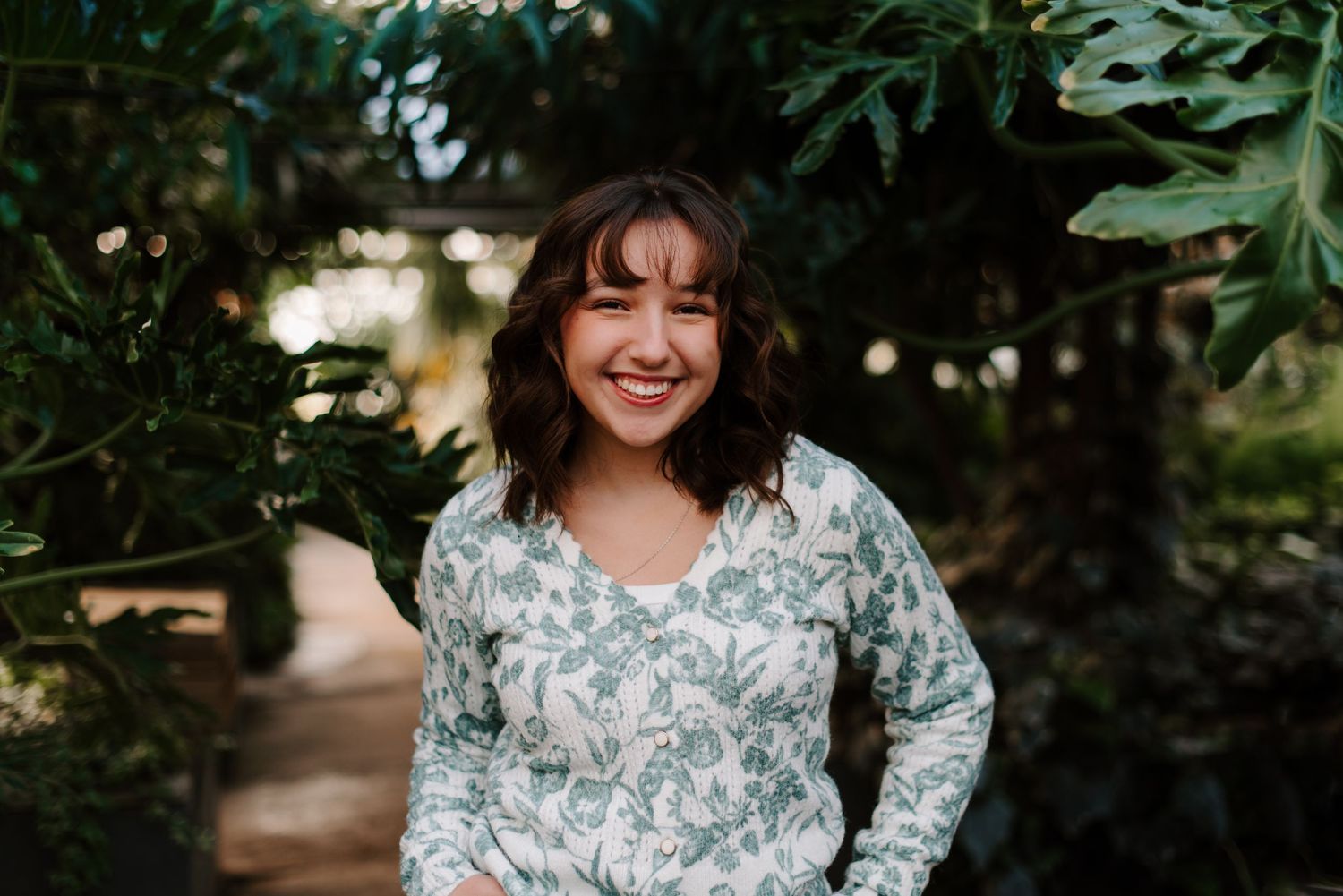 High school senior pictures Plant Kingdom greenhouse Wichita, KS