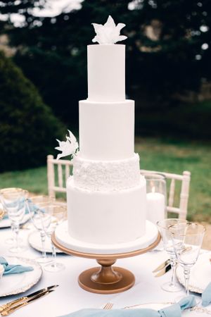 luxury all white romantic and elegant wedding cake by Sophie cake Manor by the lake wedding photographer