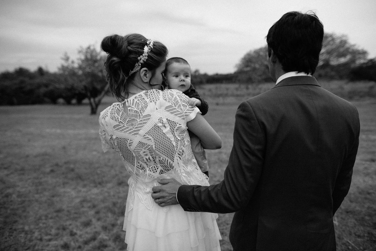 A couple and their baby  on their wedding day in Argentina
