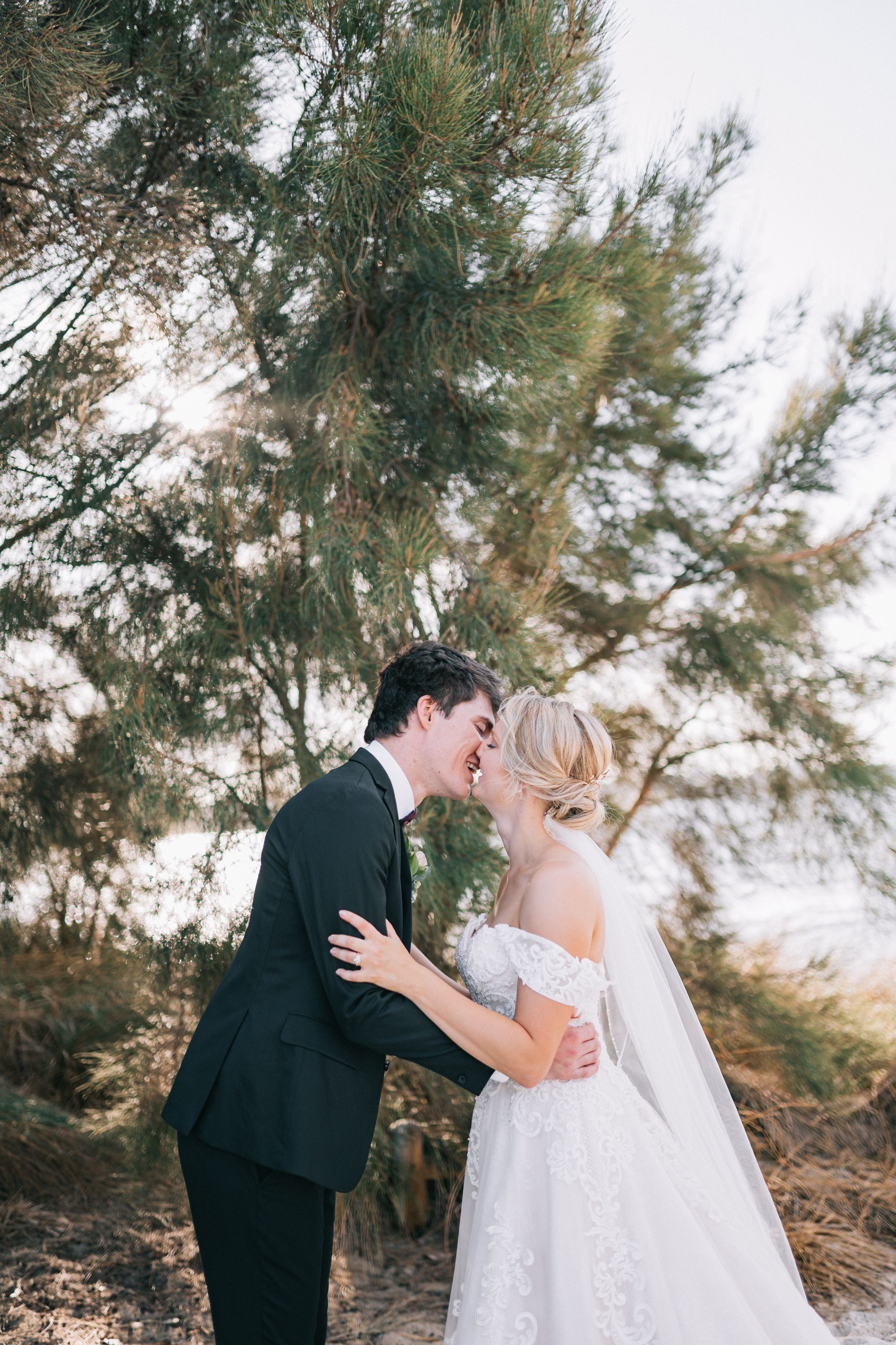 bride and groom wedding intimate couple kiss pose