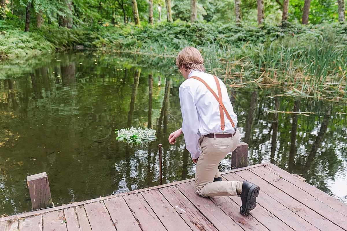 Wreath is released into the water during wedding ceremony to honor departed loved ones