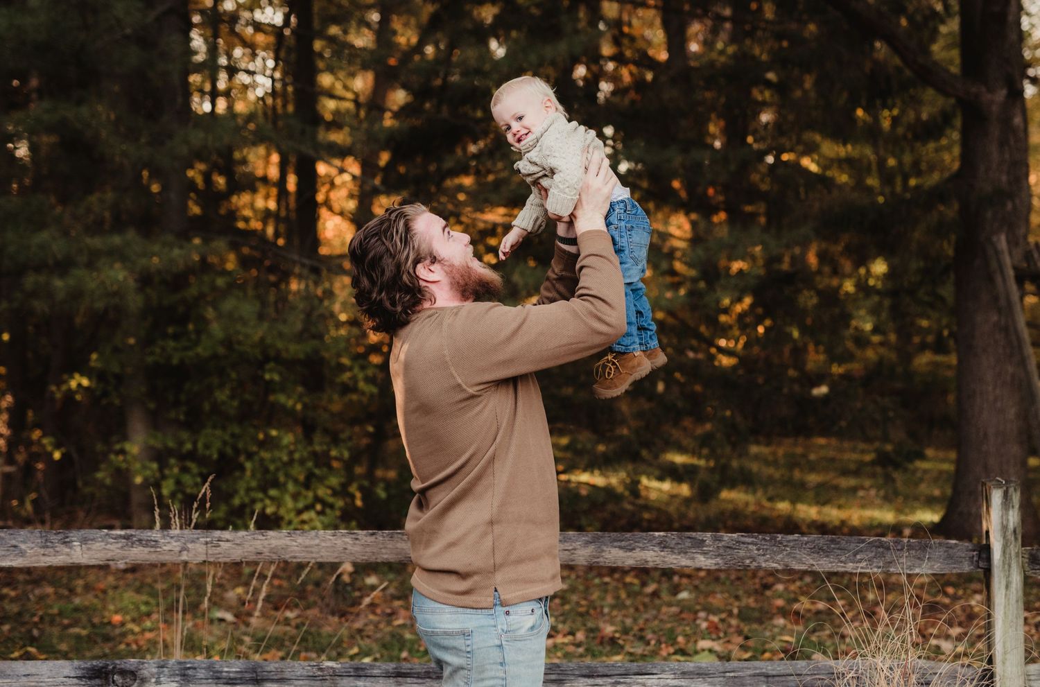 outdoor daddy and son picture in the air