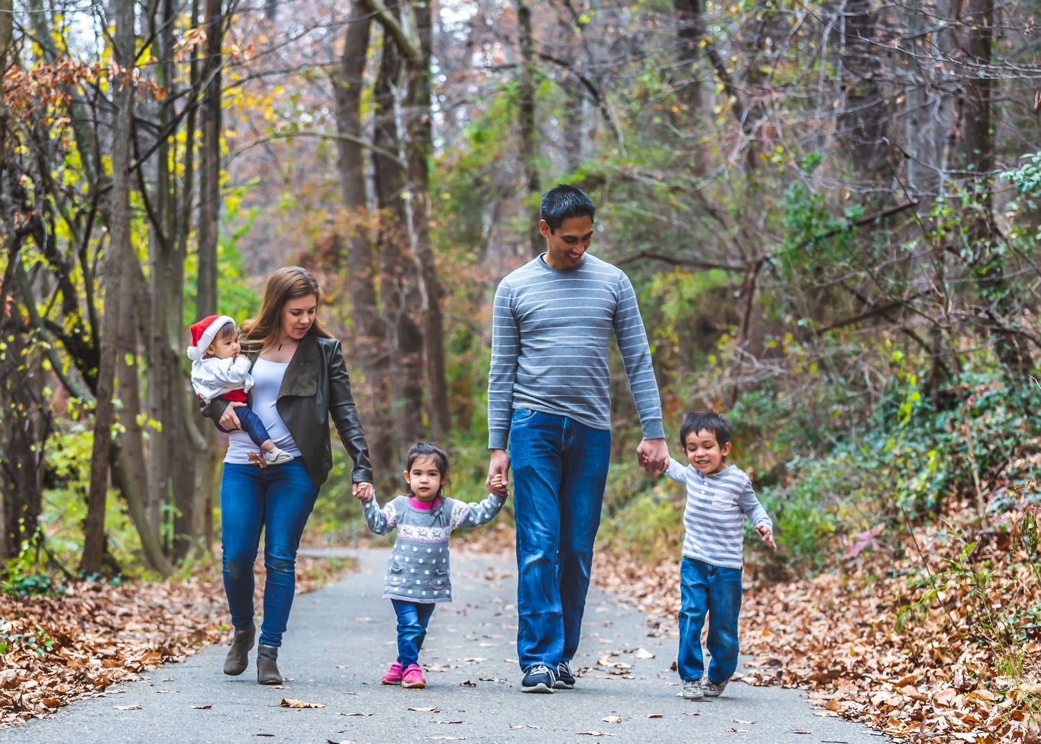 Family of mother ,father and three young kids