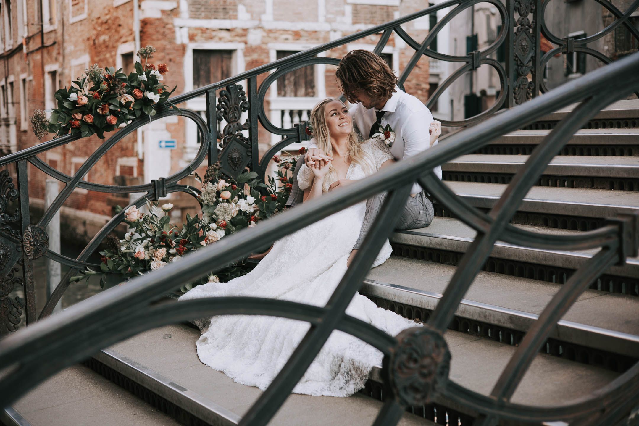Romantic wedding photo on Venice bridge for a destination elopement wedding