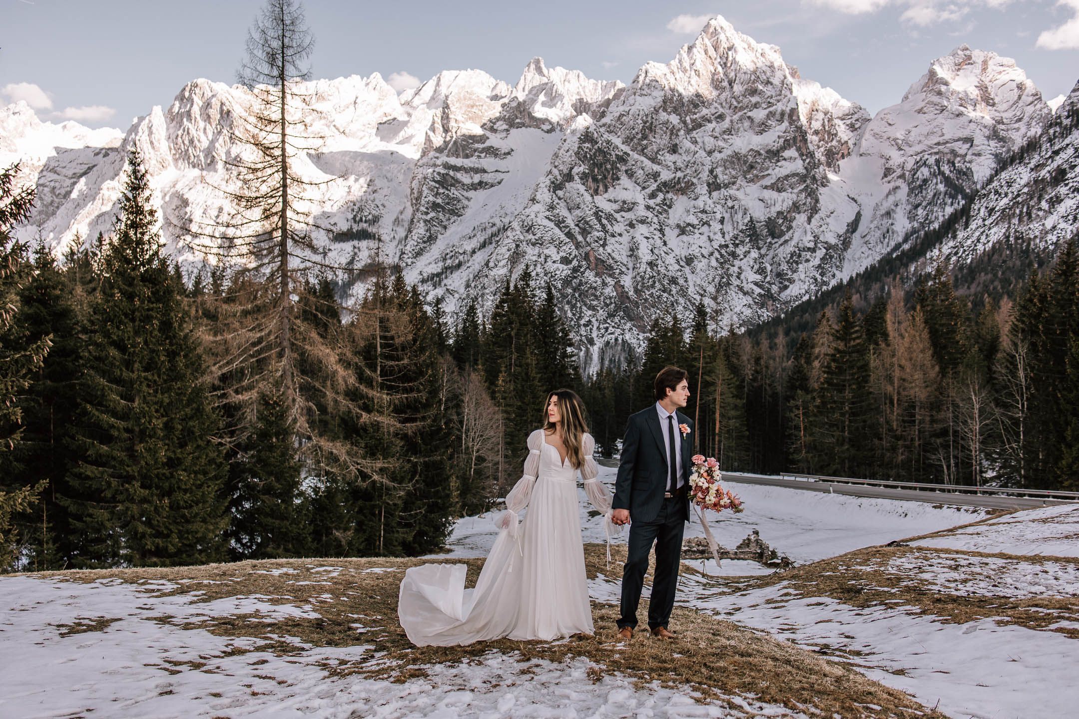 Bride and Groom in mountain in Banff Calgary Canada for an Adventure mountain elopement wedding in Italy Dolomites