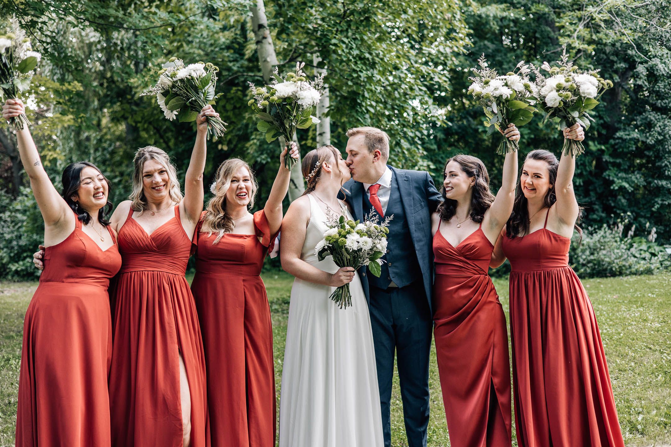 Fun bridal shoot with groom and bride and bridesmaids in a summer Toronto wedding