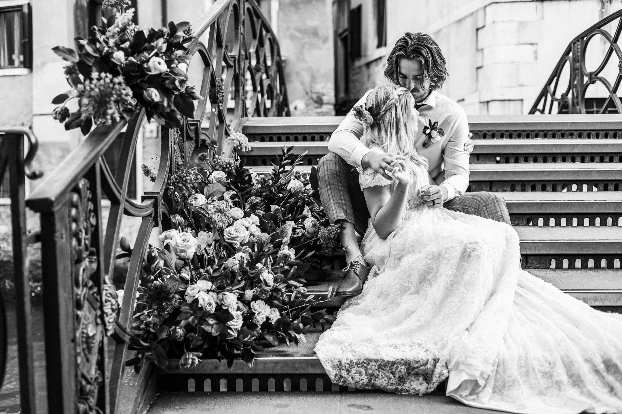 Black and white wedding photo of Bride and groom on a bride in Venice Italy for a wedding