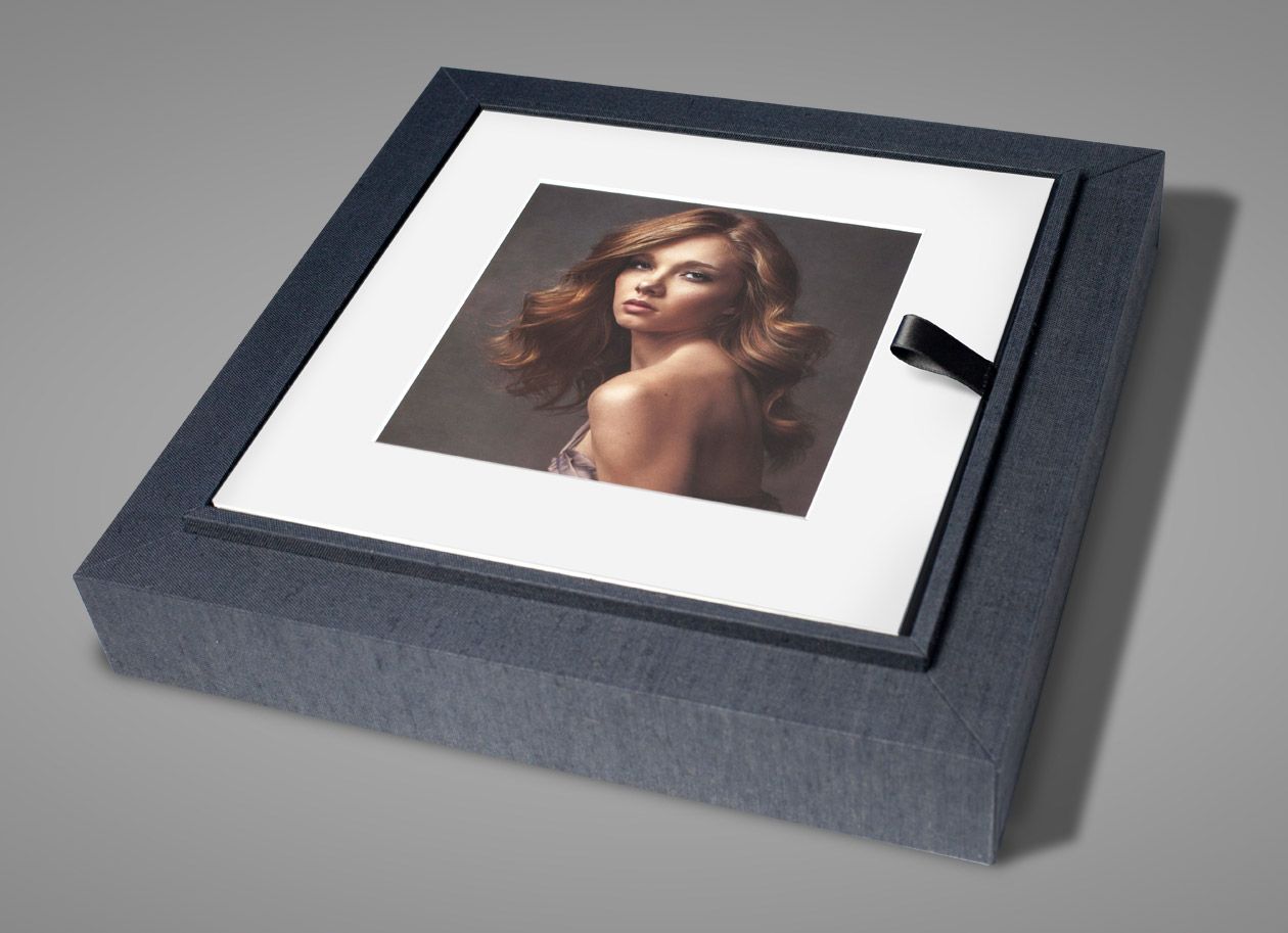 Folio box for 15 of your matted portraits with a printed cover.  Can be displayed on a table or on a shelf in your home.