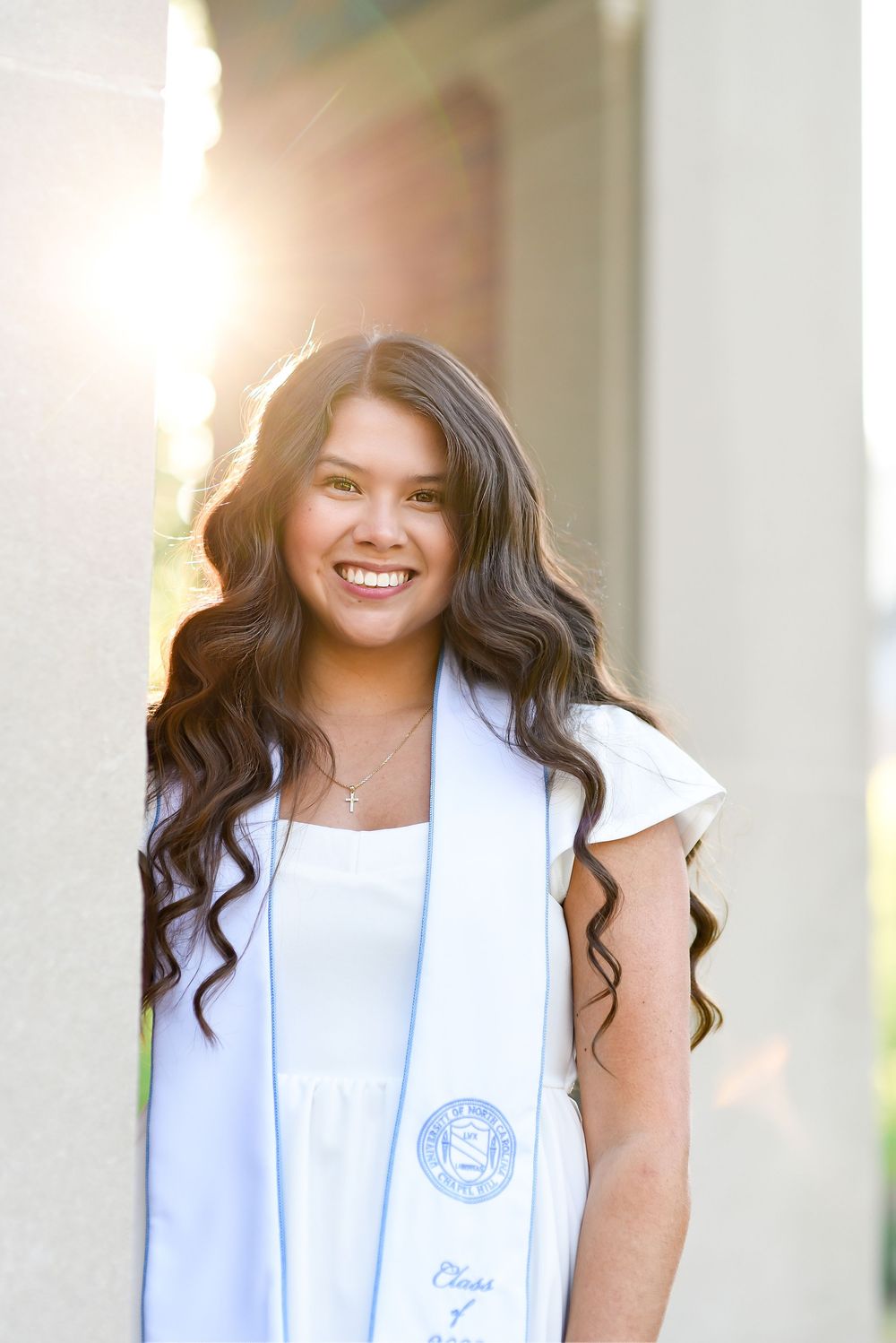 UNC girl graduate senior cap and gown the bell tower