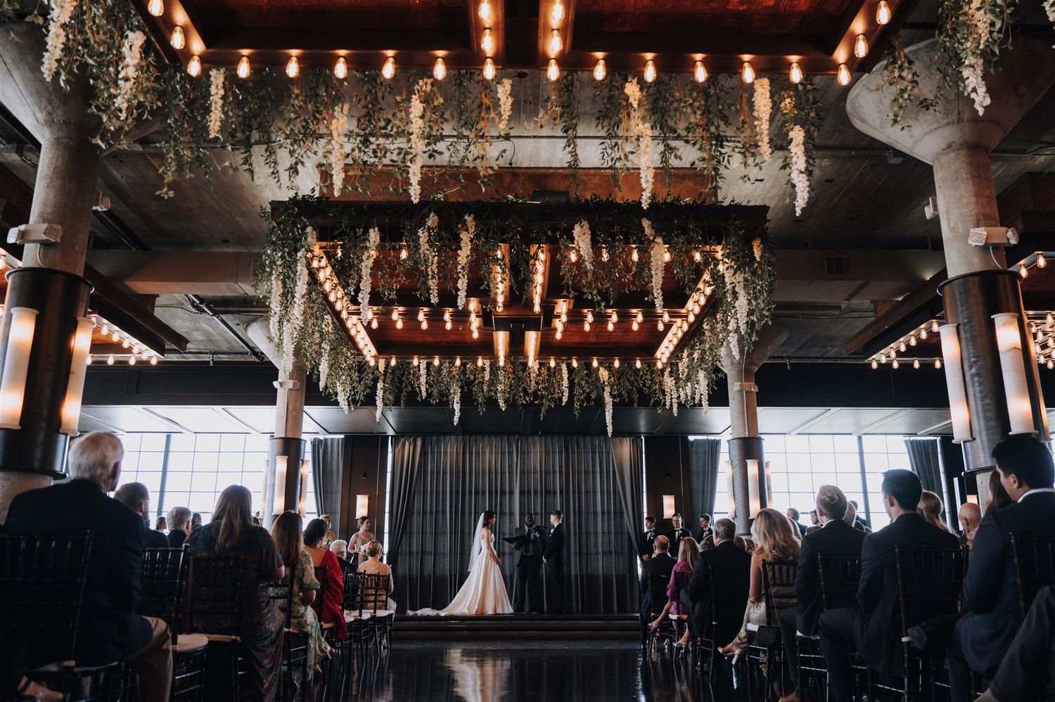 Modern wedding at The Astorian in Houston, Tx. Brides dress is from Anna Be Bridal.