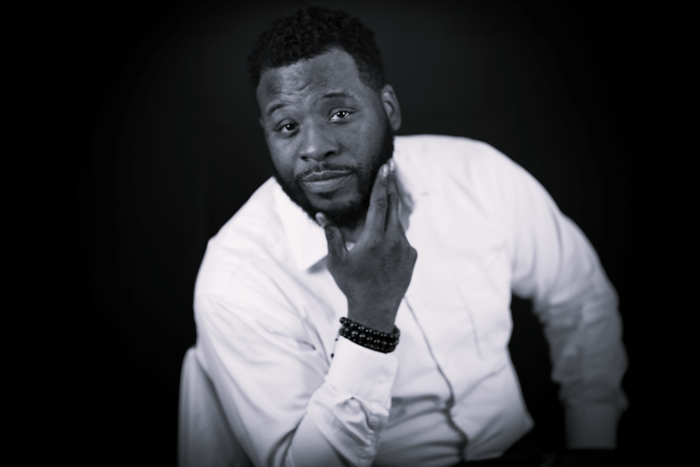 Professional headshots. Black and white photo. professional business man in white dress shirt. L Visions Photography. branding photo.