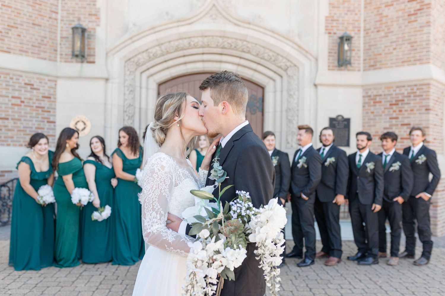 bride and groom kiss
