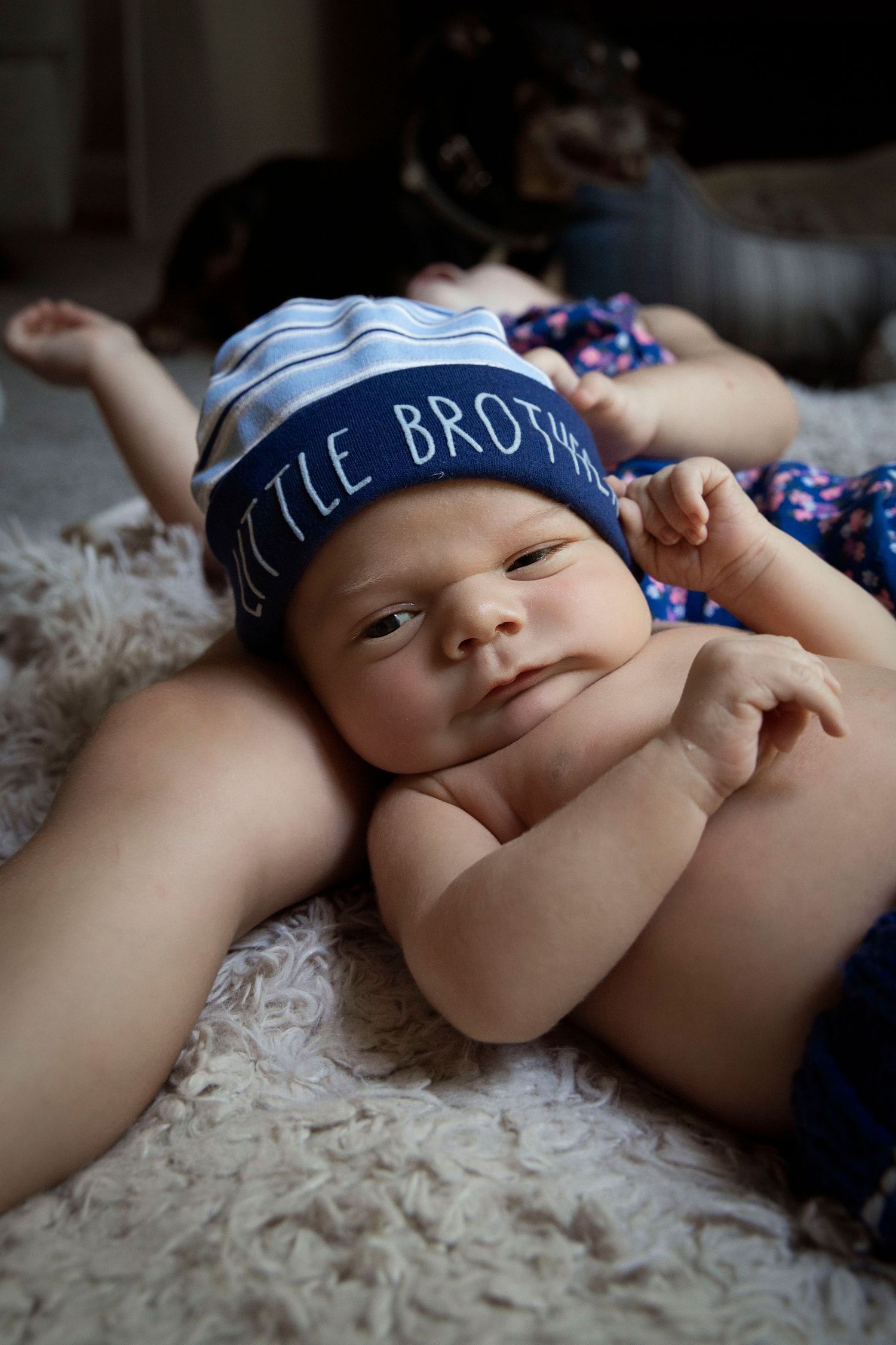 Lifestyle newborn photo in home fun