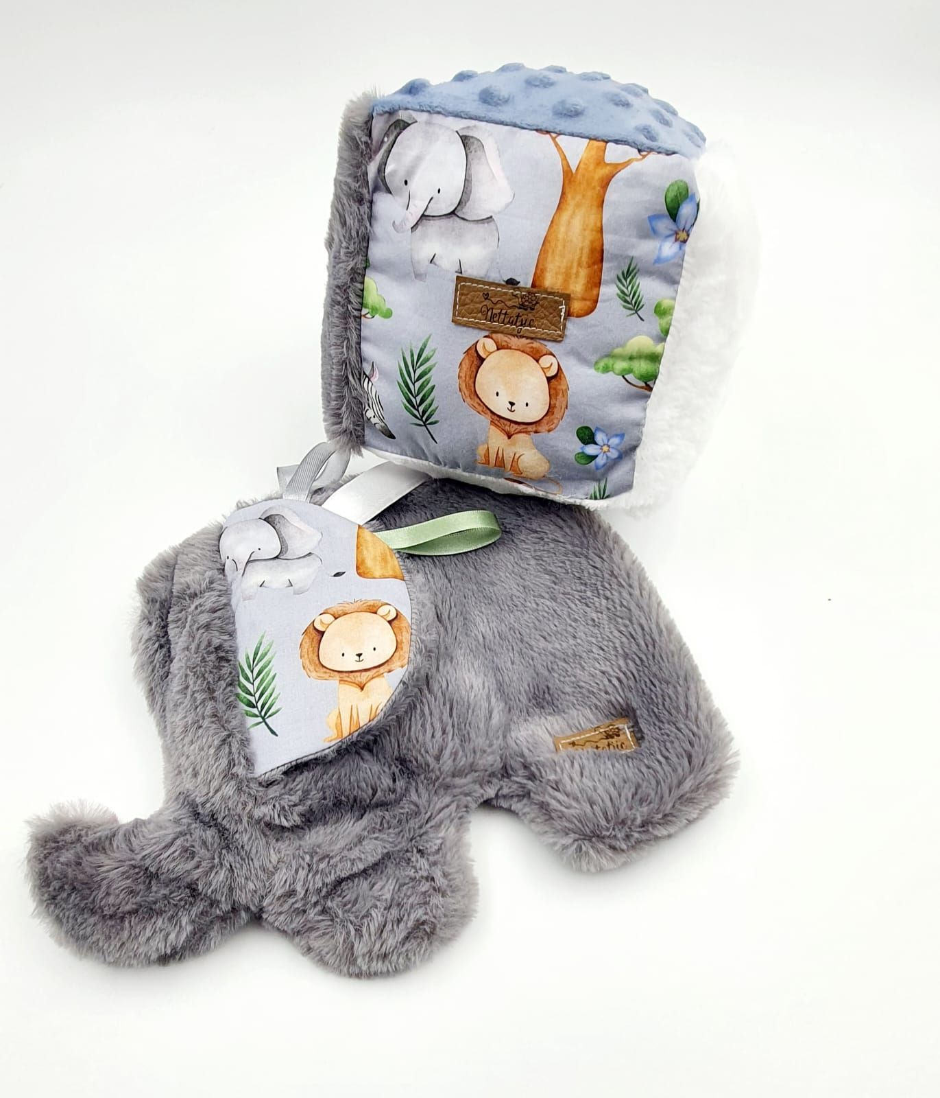 Blue and gray baby blankets featuring cute lion designs and plush minky fabric.