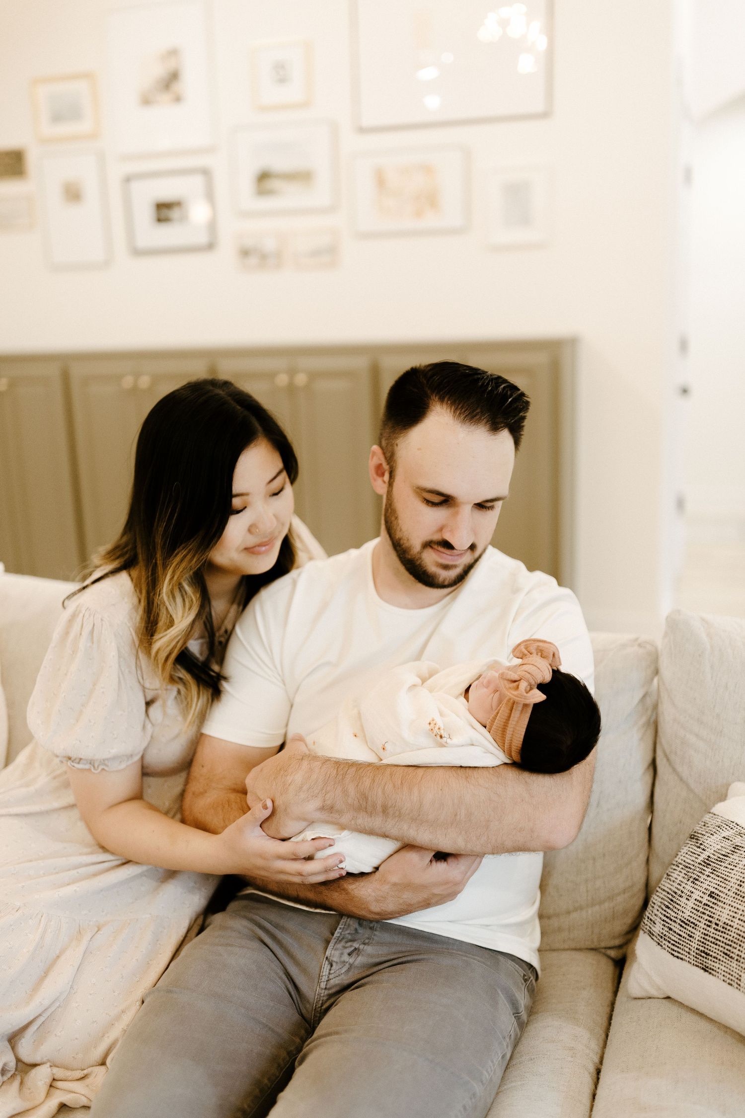 Candid family portrait in Joplin, Missouri captured in natural light by Modern Moods Imagery, showing genuine connection and movement.
