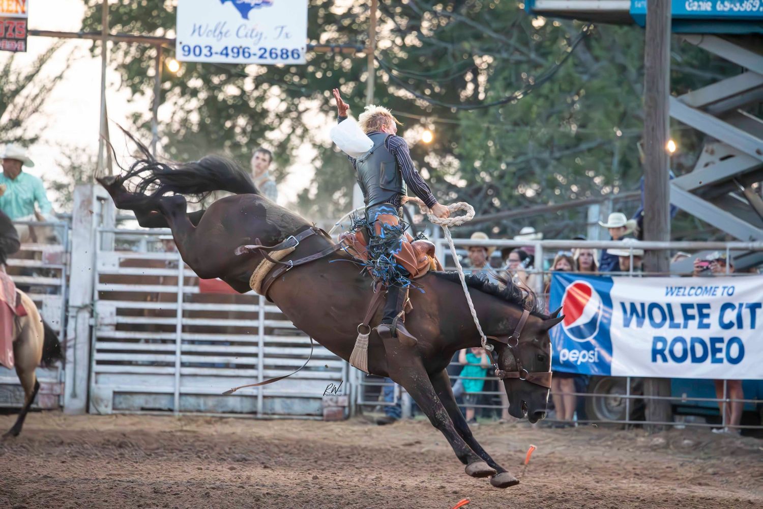 saddle bronc rider Wolfe City Texas rodeo