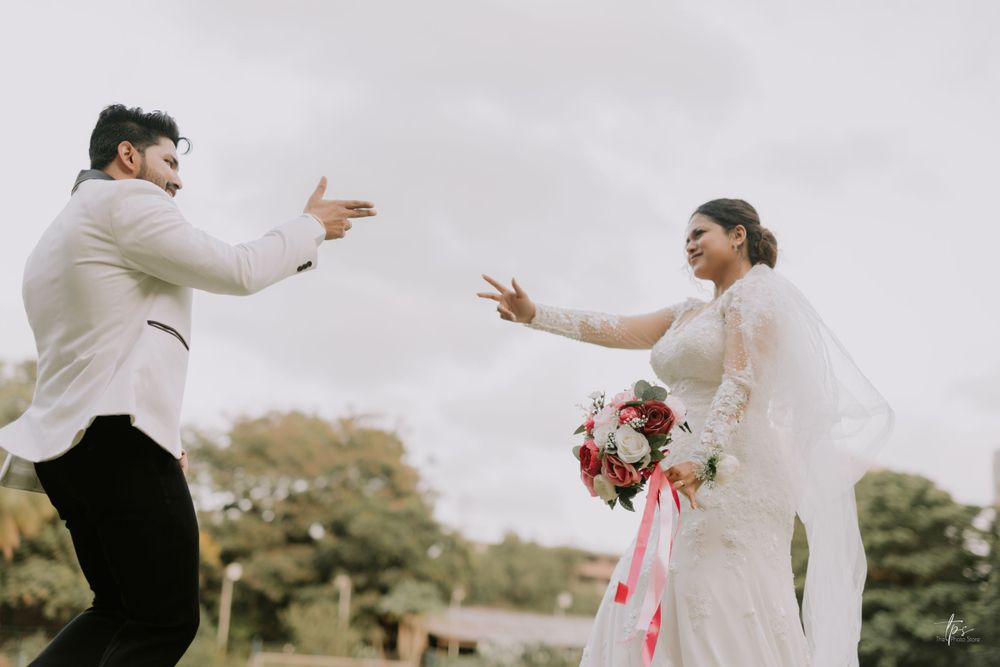 Dynamic wedding dance poses captured in outdoor setting with natural lighting.