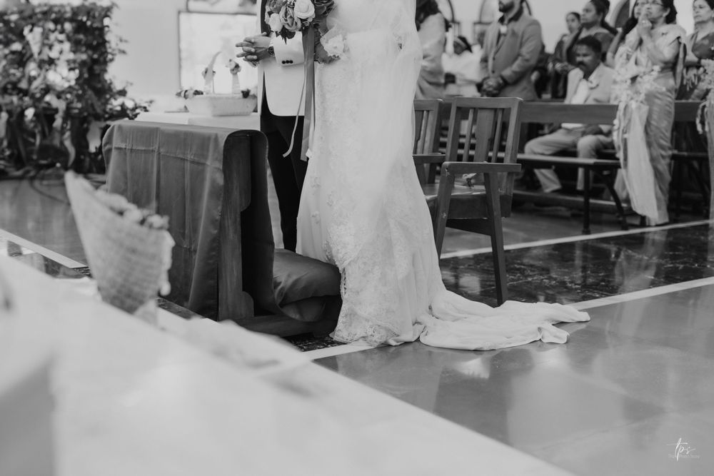 Wedding guests seated in church pews during a traditional ceremony.