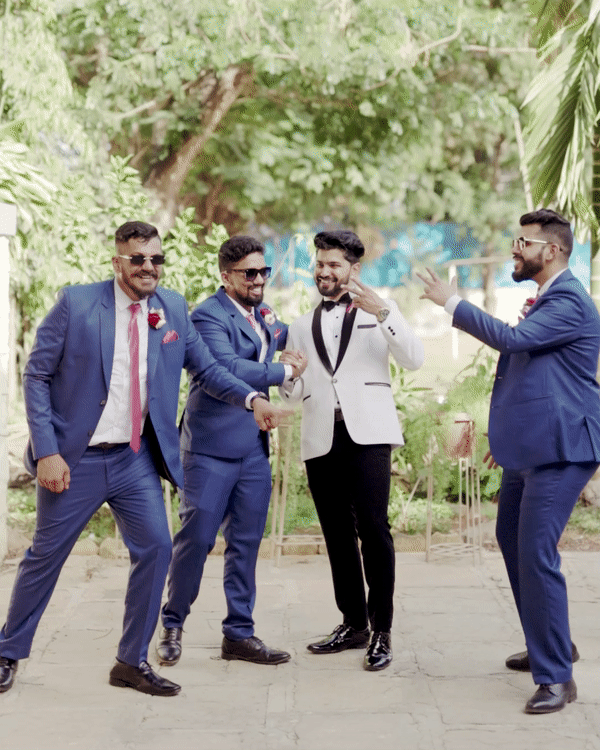 best wedding photographer in london capturing groom dance with groomsmaid