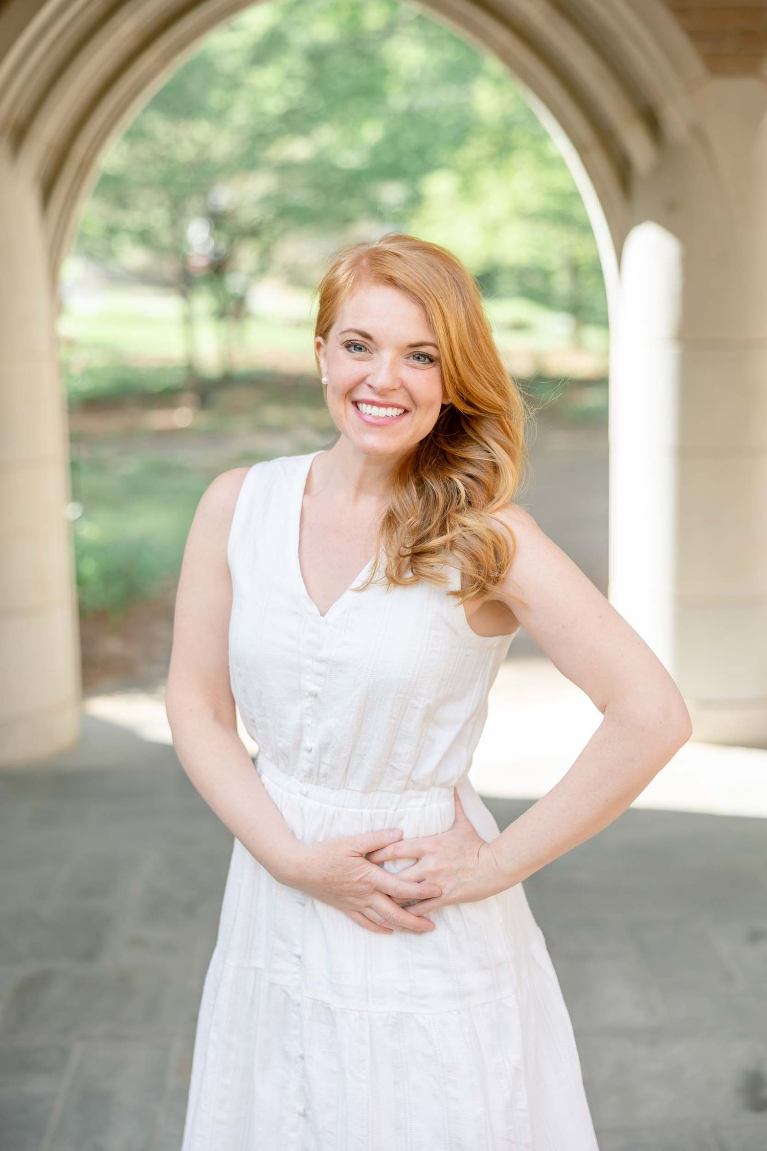 Liza Reifsnyder, East Ivy Photogoraphy, newborn photographer, red hair woman white dress outdoors arch, family photos