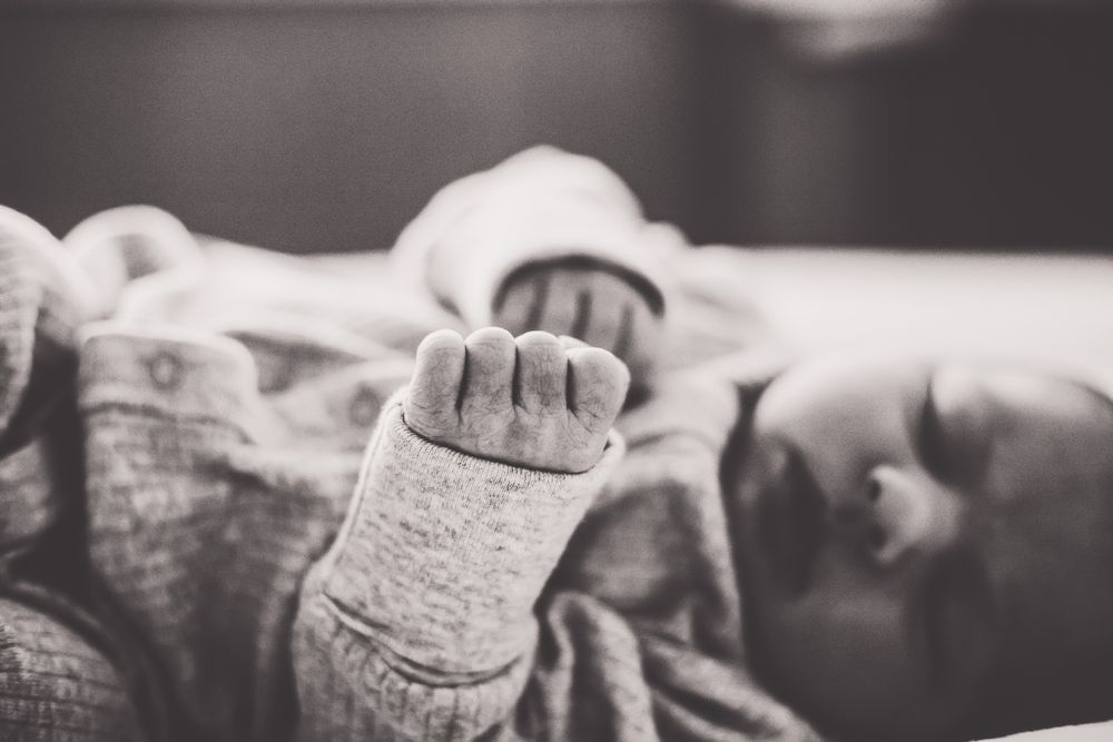 Newborn hands at Brodstone Memorial Hospital in Superior Nebraska.