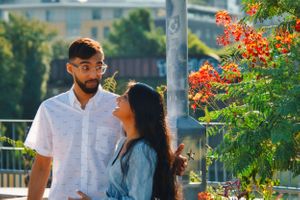 couple laughing while posing