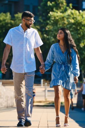 couple walking hand in hand