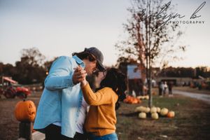 Multi-panel photo collage showing couple in blue and orange outfits during a romantic sunset engagement photoshoot.