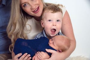 High-end baby portraiture focusing on the first days of a new legacy.