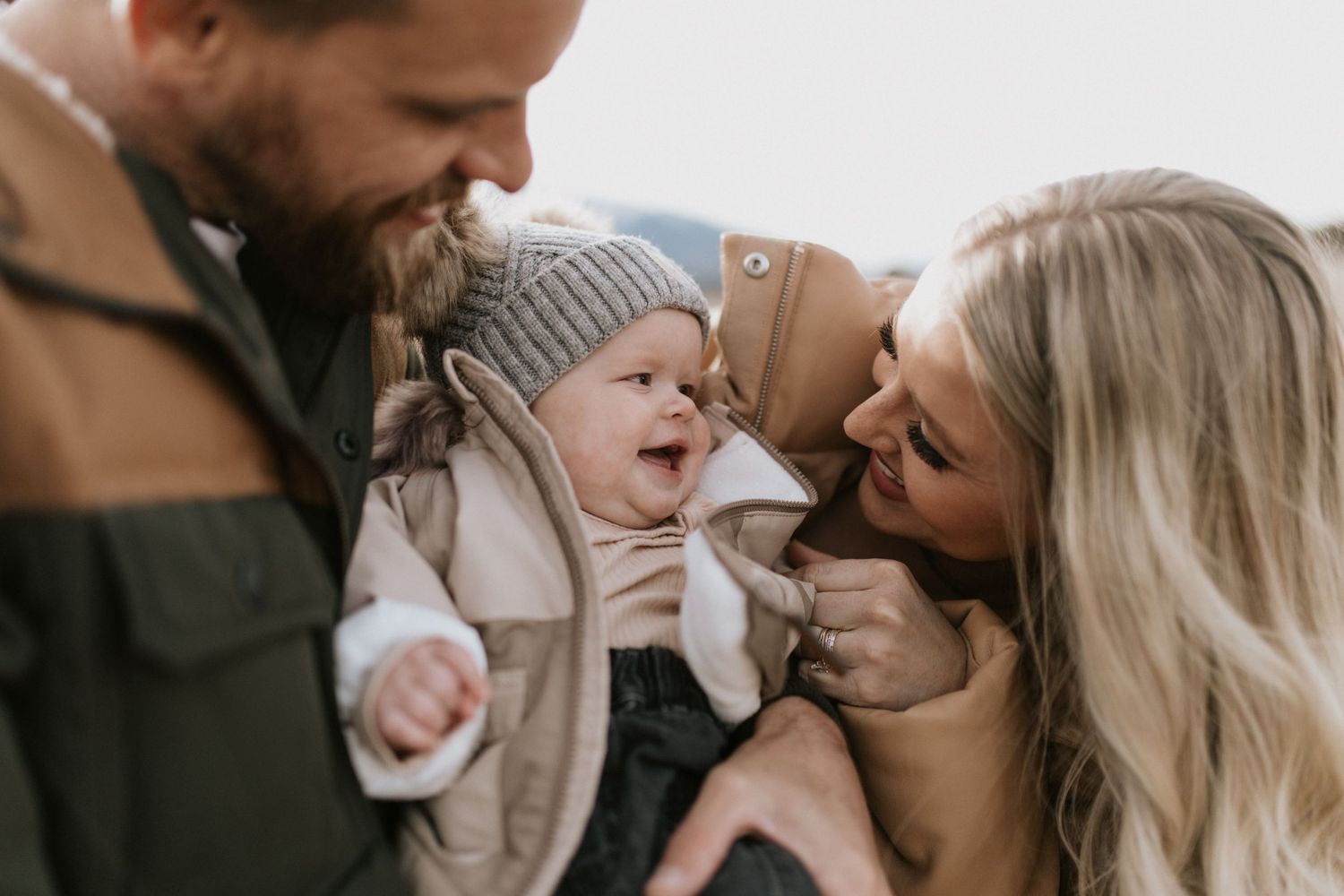 A joyful family moment captured during an outdoor lifestyle photoshoot.
