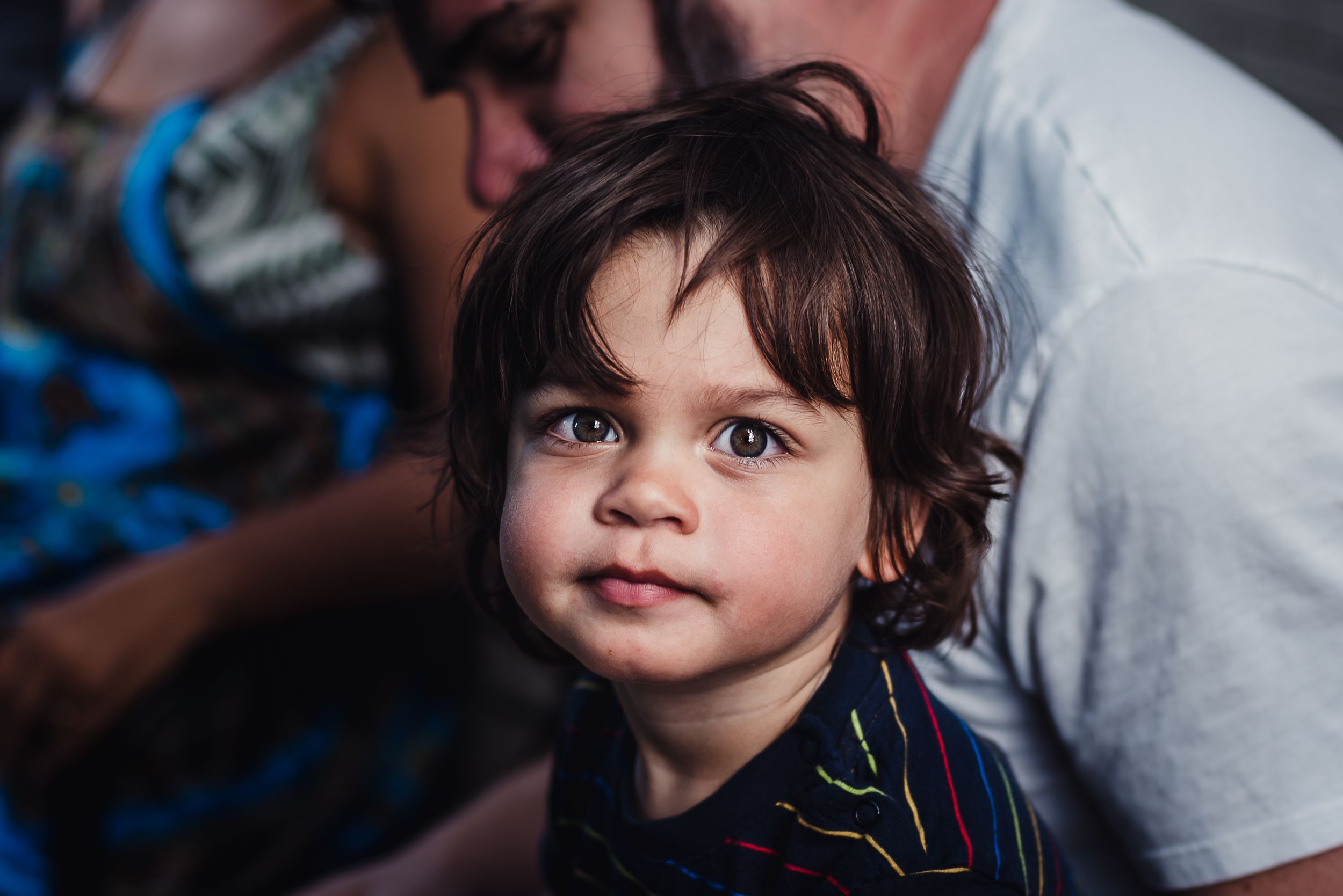 Portrait of a young child looking directly at the camera.