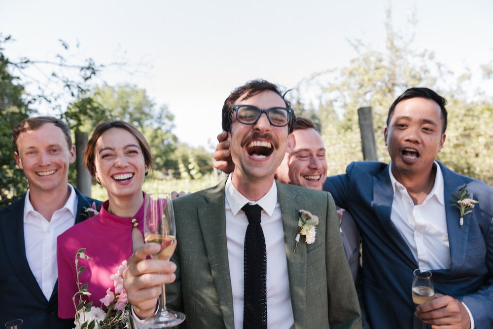 Matt laughs joyfully on his wedding day