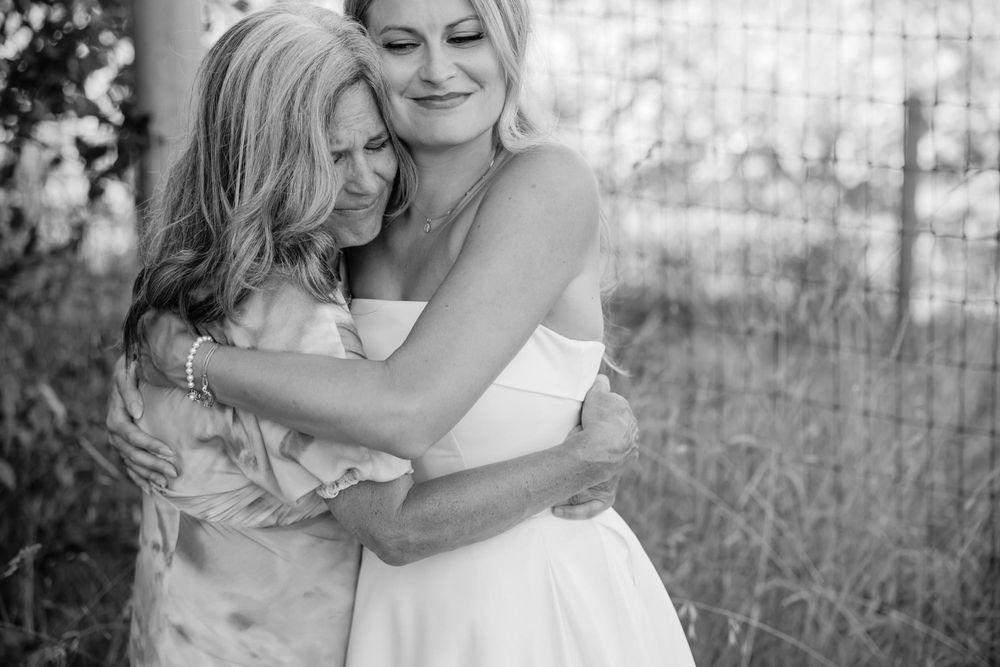 An emotional moment while Emery gives her mom a big hug on her wedding day
