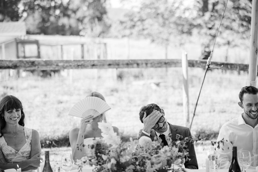 The bride and groom enjoy and laugh