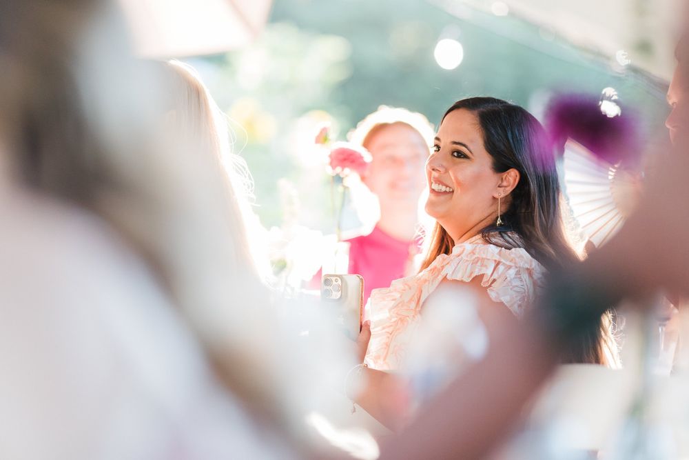 Wedding guests look on lovingly
