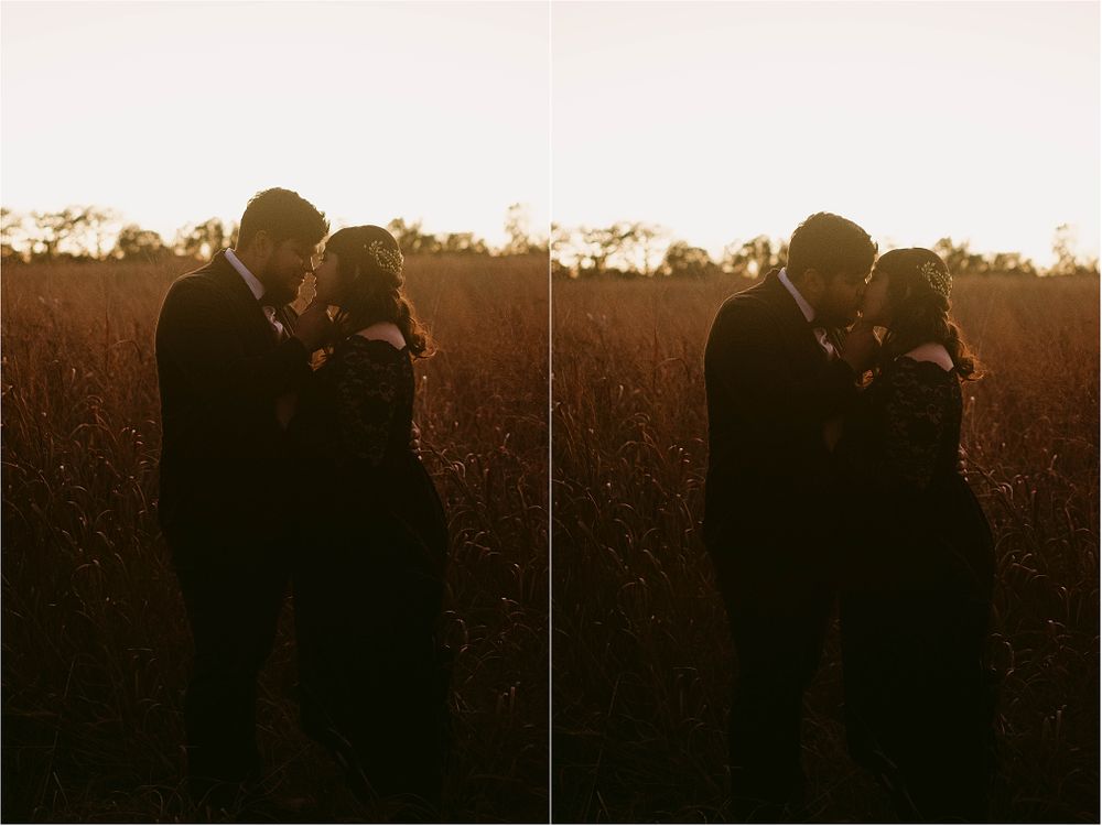 Romantic silhouettes of a couple in love captured during sunset in a field.