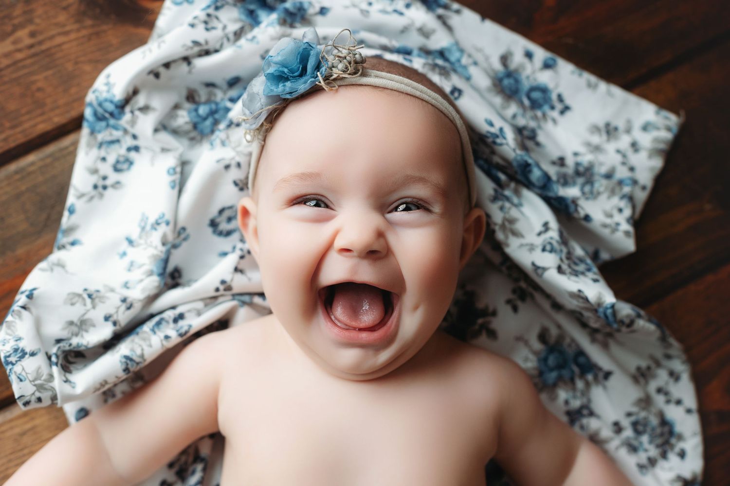 Milestone session with a 6-month-old smiling so big at the camera. Greenville, SC newborn photographer, Easley, SC Newborn photographer