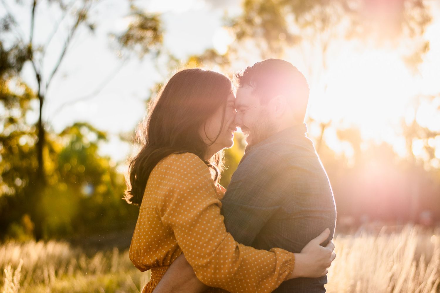 Couple cuddling, nose to nose in sunset Dubbo Photography