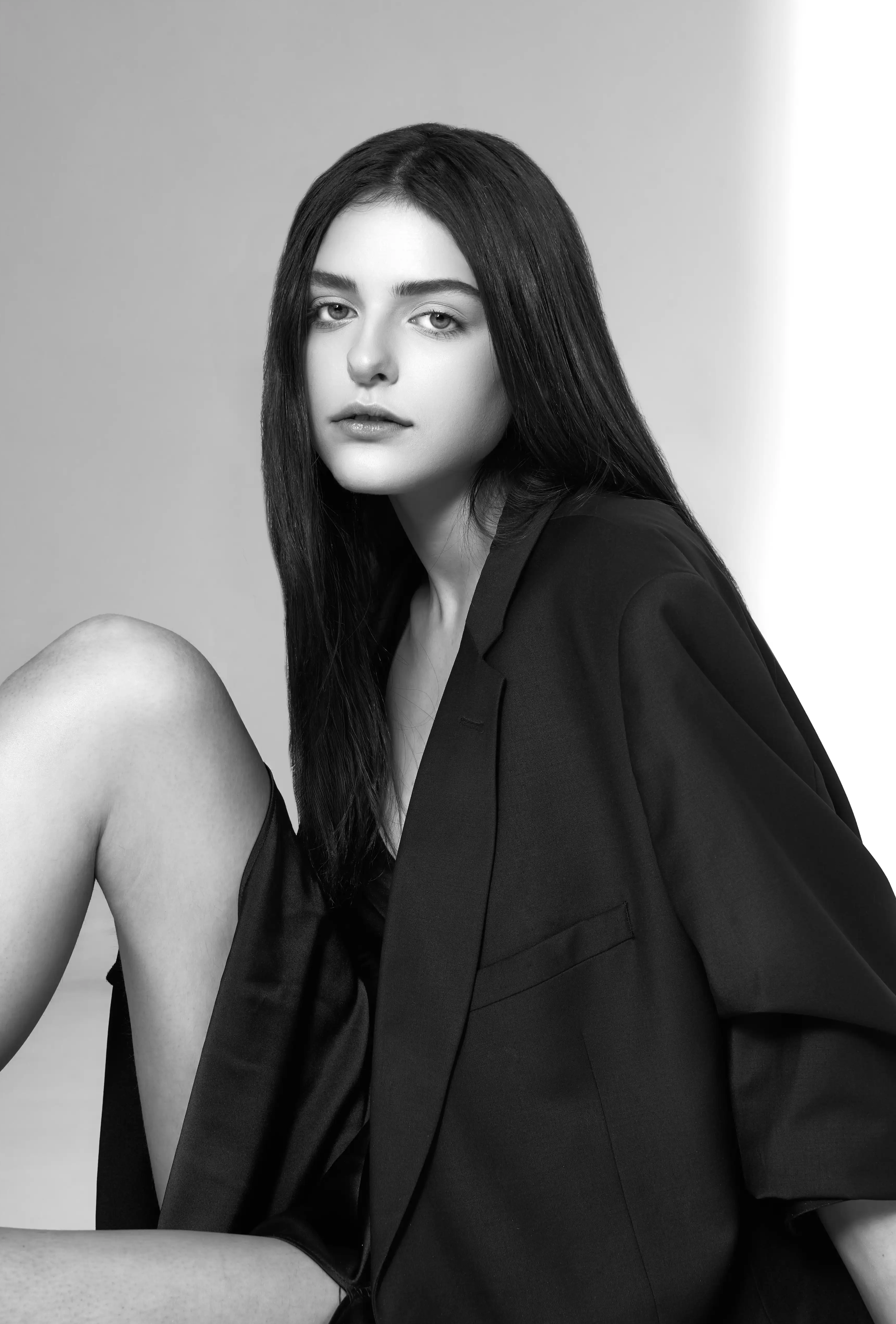 Professional portrait of young woman with natural lighting in Dubai studio