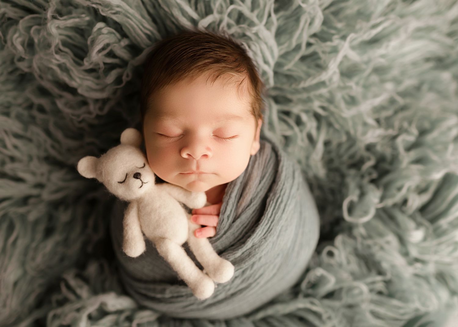 Moreno Valley newborn photographer, baby in blue with bear