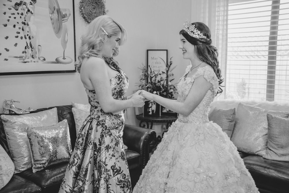 mother and daughter holding hands. Verona Event Center. Pharr, Texas. Wedding photography