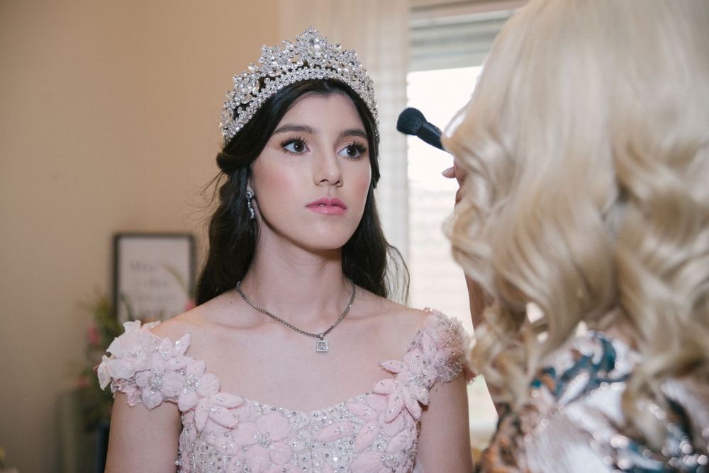 quinceanera getting make up on. Verona Event Center. Pharr, Texas. Wedding photography