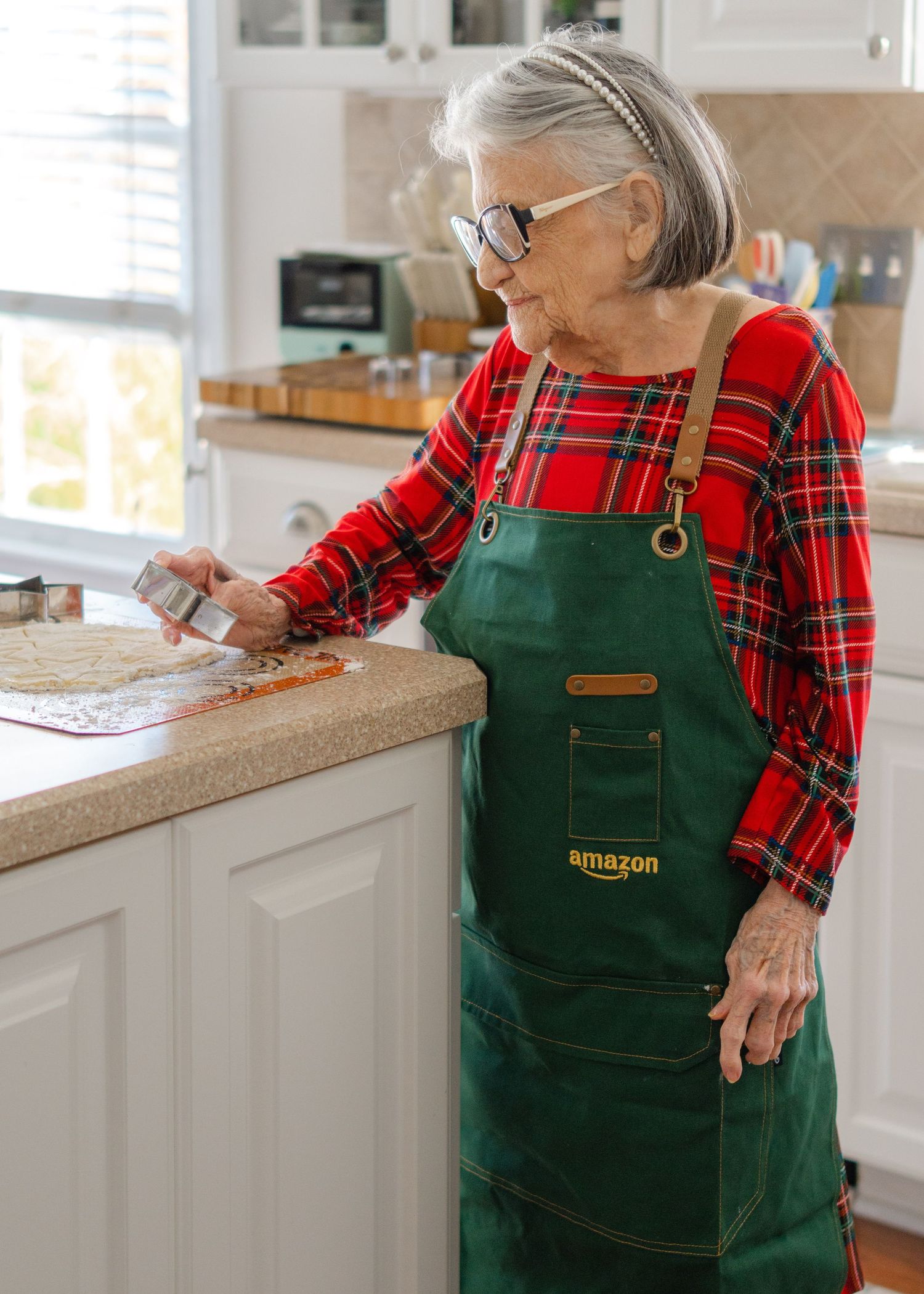 Woman in tartan dress