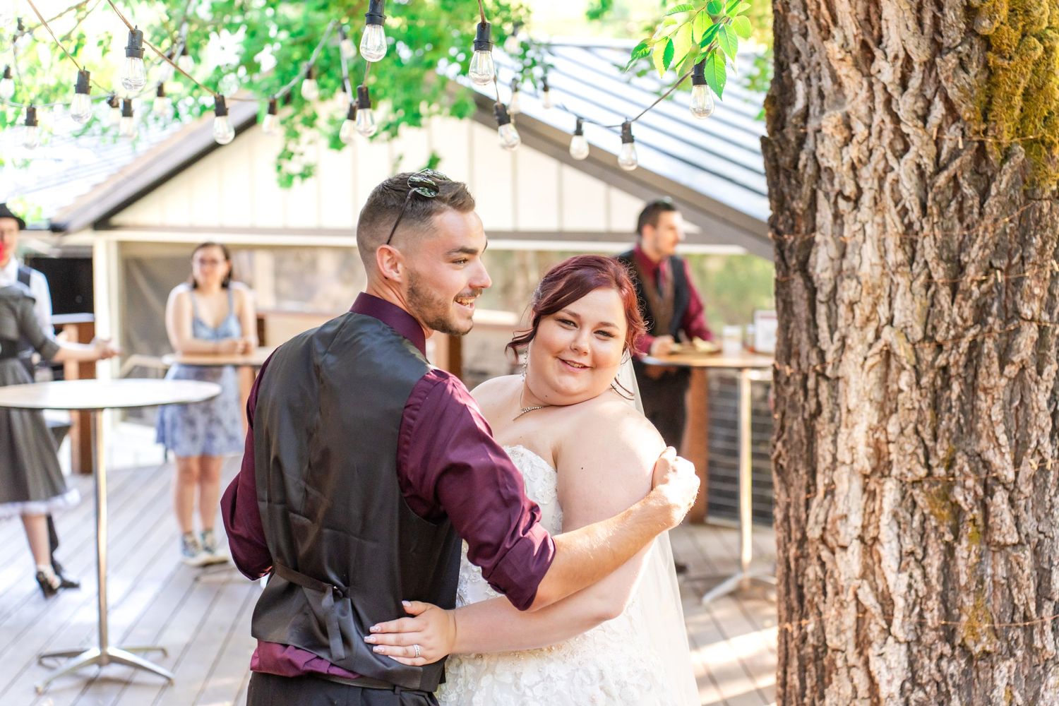 bride dances with her brother portrait