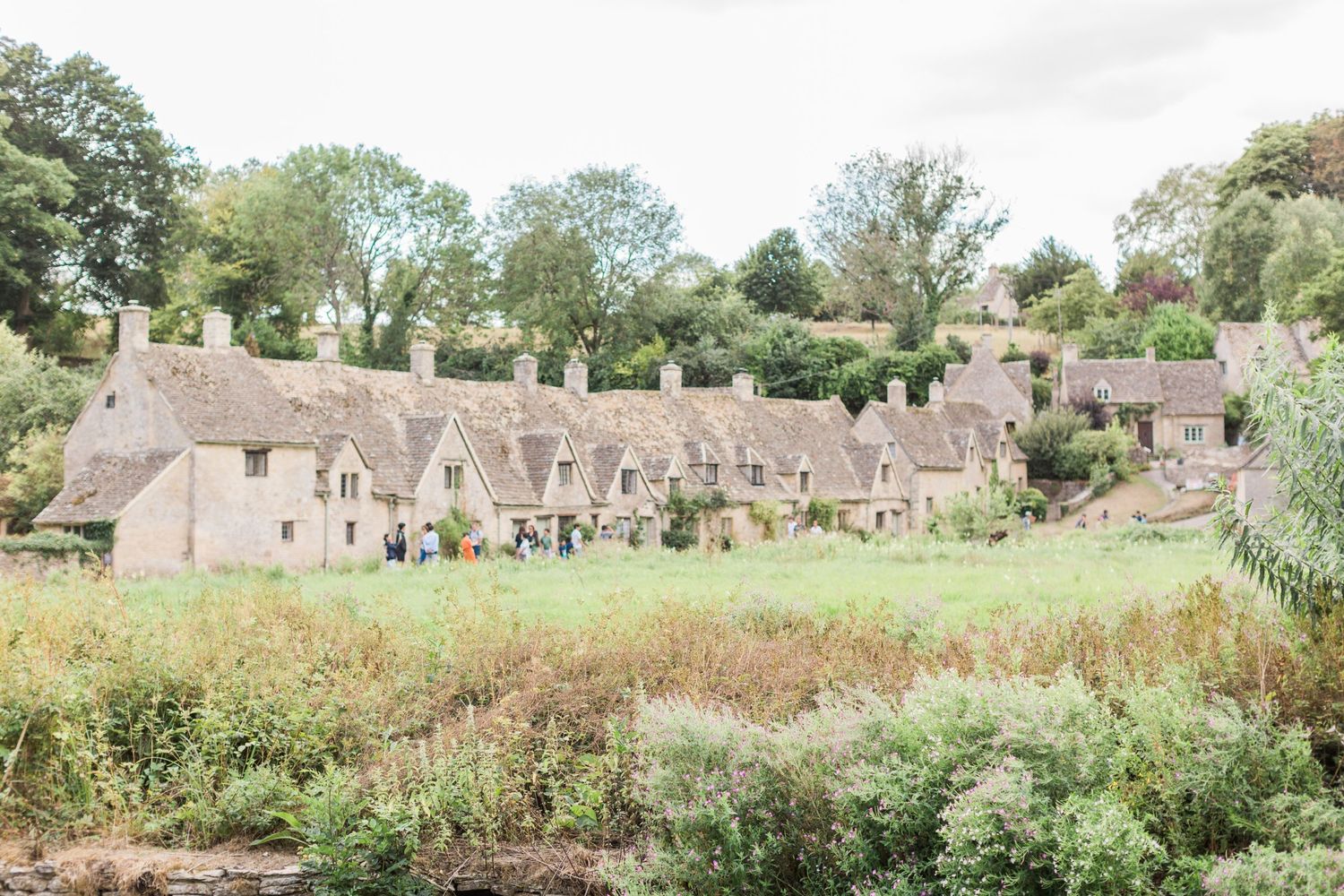 Hayley Elizabeth Photography The Swan Bibury Cotswolds wedding photographer row of iconic cottages in the village