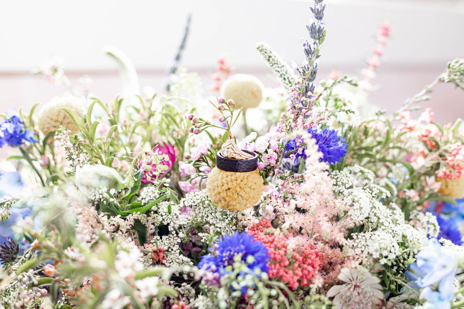 ring on top of bouquet of flowers