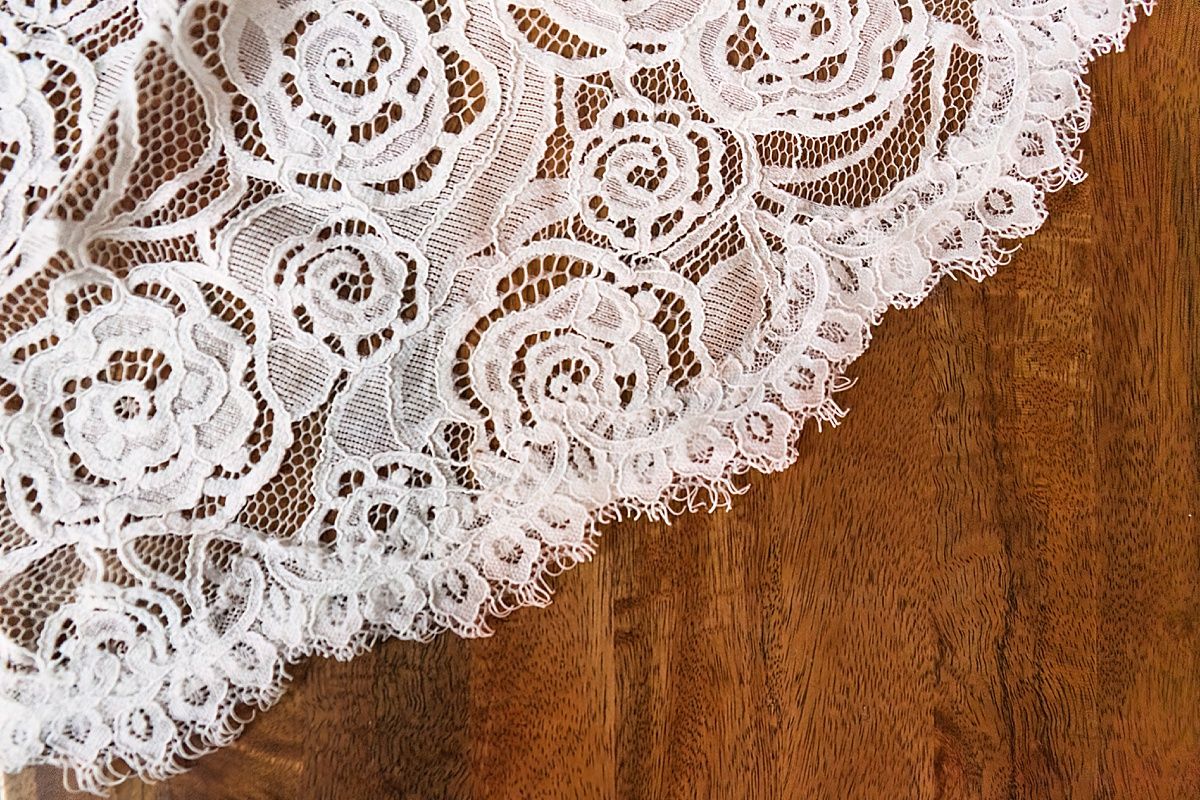 detail of lace wedding dress photographed