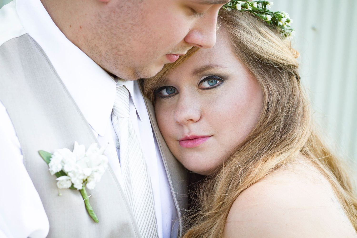 Bride with groom at the Clever Barn in Clever MO