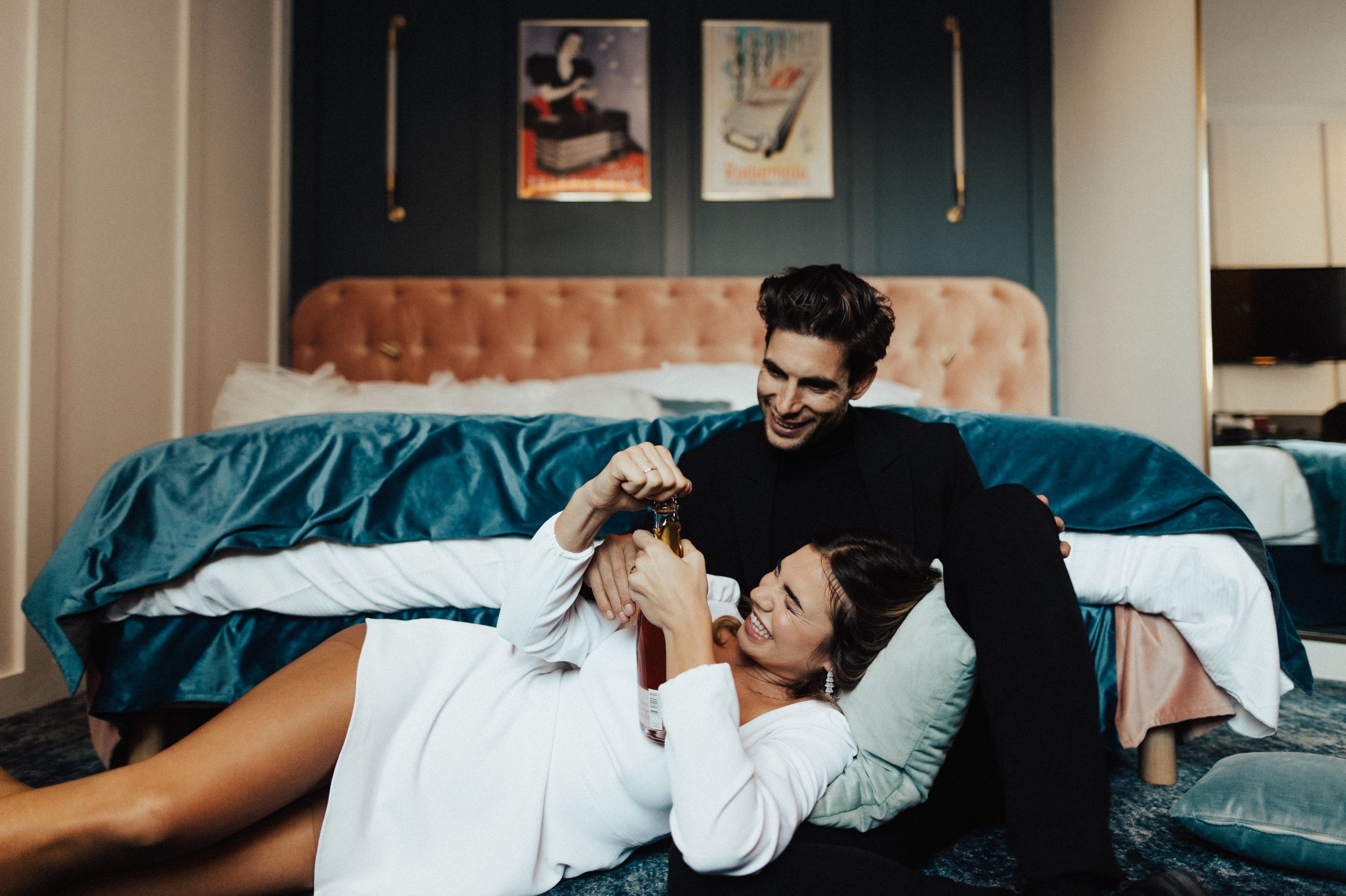 Indoor couple portrait session with modern home decor elements.